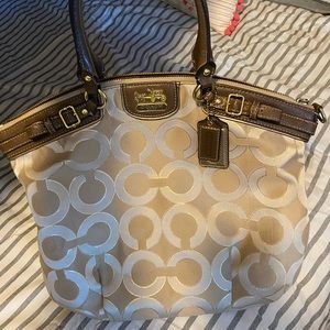 Coach Madison OP Art satchel with signature detail